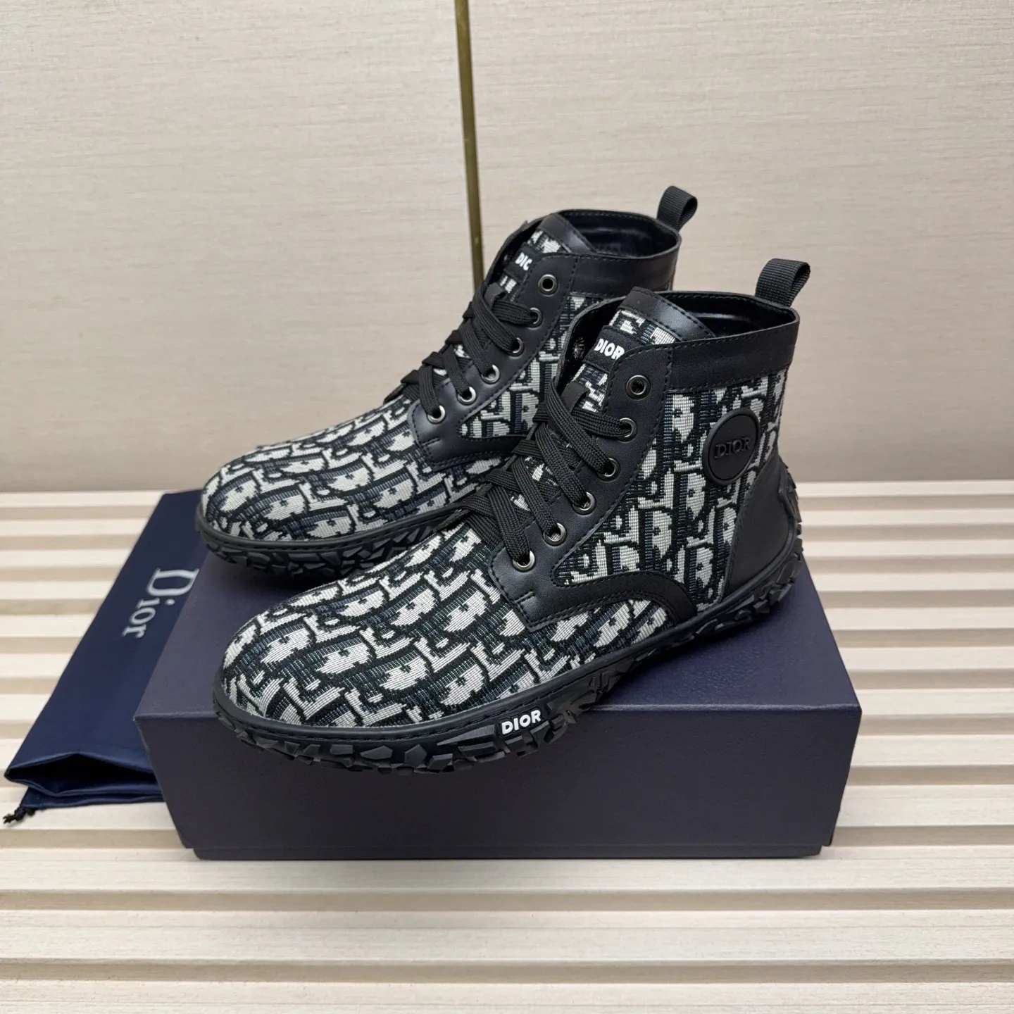 Men's Shoes 💰440 Dior A practical choice that combines protection with classic style. Made from durable Rugged Calf leather, it's tumbled and hand-finished to create a soft suede feel with a rich texture. Elastic side panels and subtle cutouts are inspired by the classic Chelsea boot. Leather upper and lining with Kummel tabs at front and rear, rubber outsole